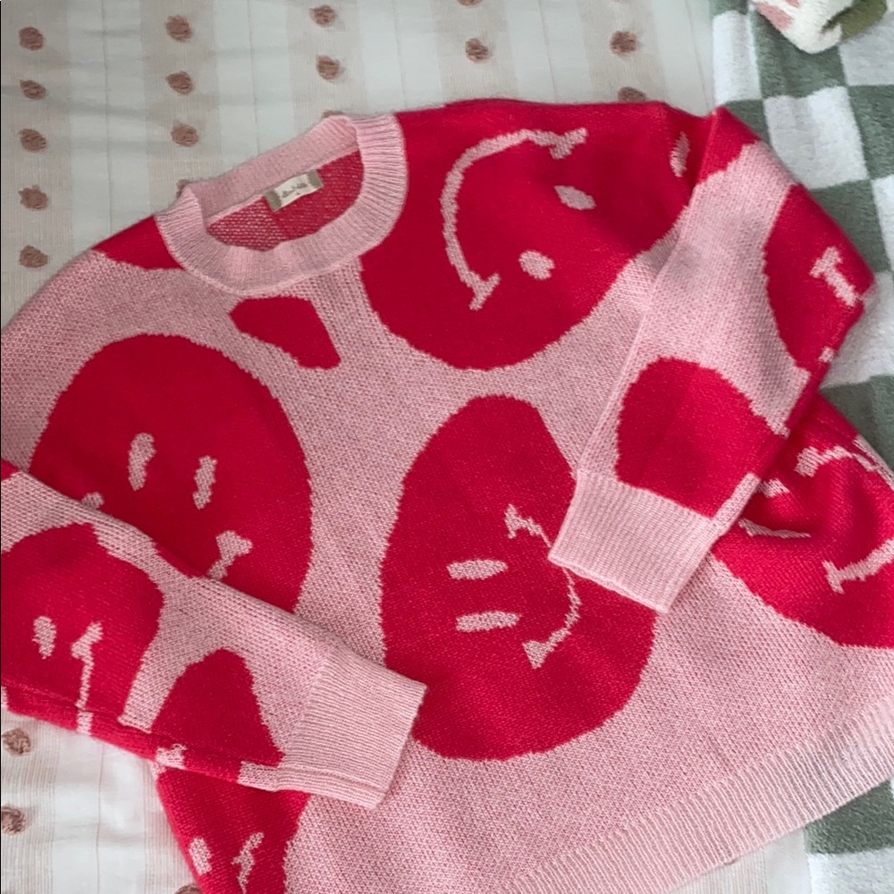 Vibrant Pink and Red Crew Neck Sweater with Playful Patterns